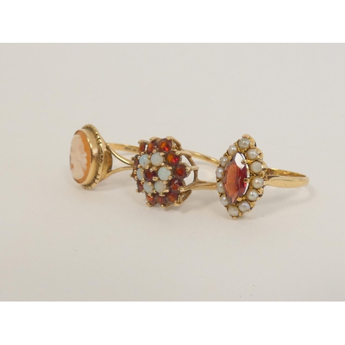 40 - Two garnet cluster rings and a cameo ring, all 9ct gold. 