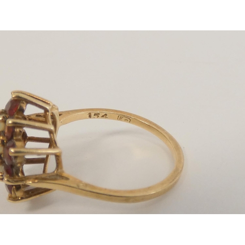 40 - Two garnet cluster rings and a cameo ring, all 9ct gold. 