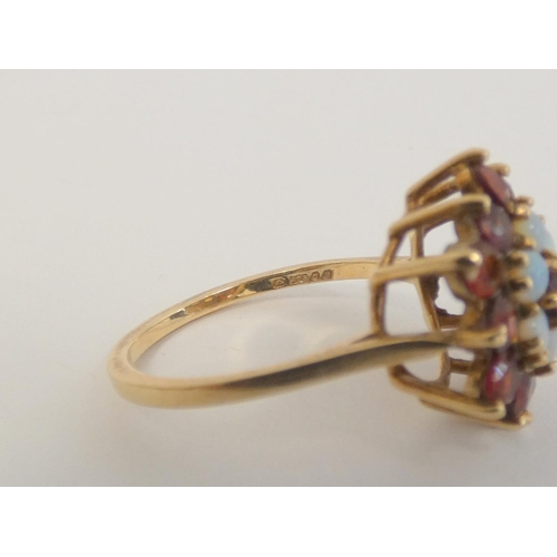 40 - Two garnet cluster rings and a cameo ring, all 9ct gold. 