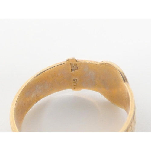 7 - 9ct gold buckle ring 3.9g.