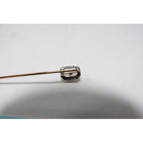 282 - 14k white gold stick pin, the yellow metal pin unmarked, set with a seed pearl, in fitted case.