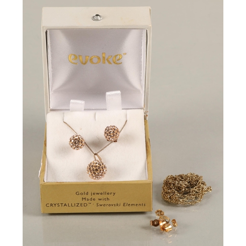 111 - Evoke Gold'n'Ice Swarovski jewelled pendant and earring set in 9ct gold hardware and chain, with a 9... 