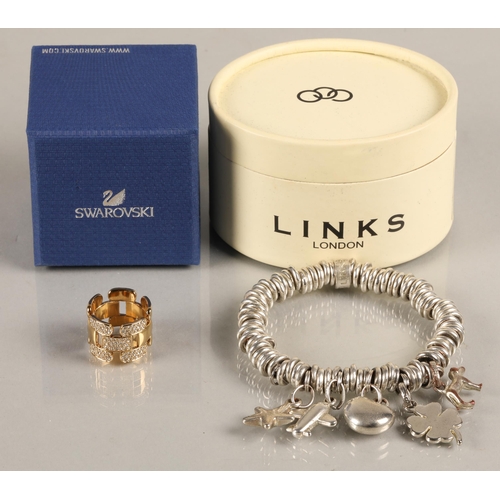 116 - Gold toned Swarovski ring, size M/N, and a Links of London charm bracelet, both with boxes