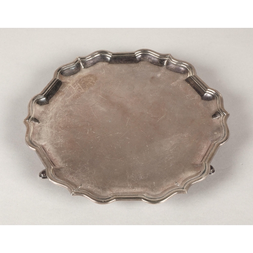 220 - Silver salver raised on three feet, 21cm diameter, Sheffield 1966, 332g