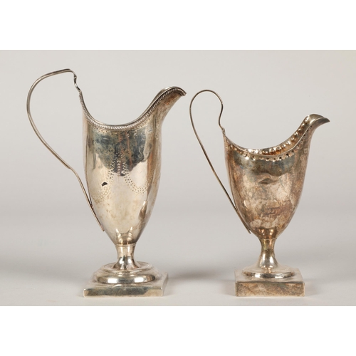 223 - Two silver jugs George III London 1790 and partly illegible possibly 1785, gross weight 171g