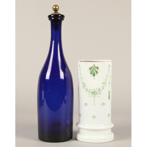 264 - Bristol blue glass bottle and topper with an opaque glass cylindrical vase with enamelled and painte... 