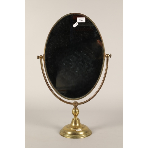 358 - Brass oval swing mirror.