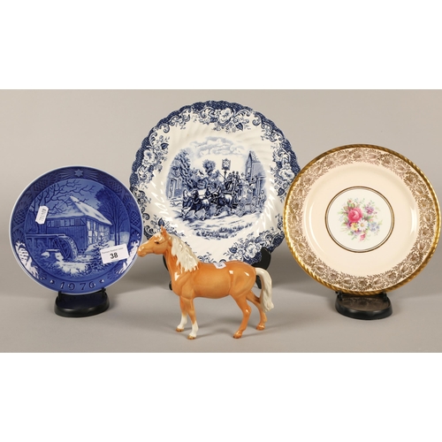 38 - Beswick model of a pony, a Royal Copenhagen 1976 Christmas plate and two others.