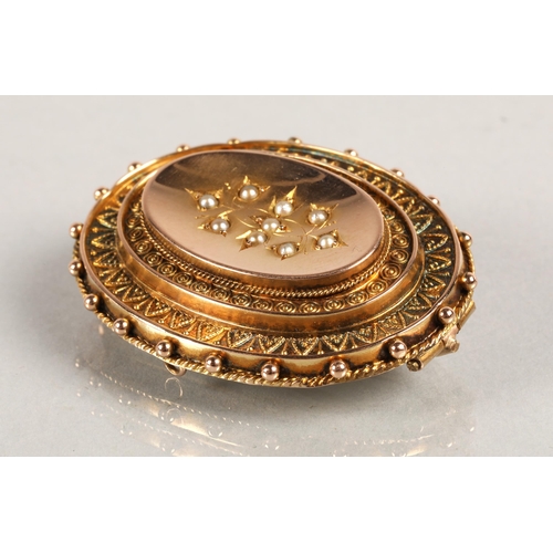 51 - 9ct gold mourning brooch set with seed pearls, 5.2g without glass insert