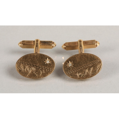 67 - 9ct gold pair cufflinks set with white gems, 5.7g