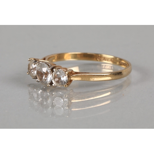 72 - 9ct gold ring set with a trio of white gems, ring size Q, gross weight 1.8g