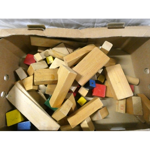 241 - Box of wooden building blocks.