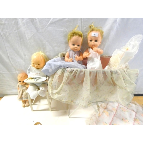 247 - Twin 1950's Chiltern dolls also a crib and two other dolls.