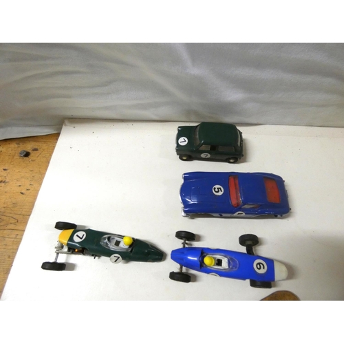 249 - Vintage Scalextric to include Mini, Aston Martin etc.