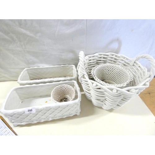 250 - Various indoor planters to include three basket planters.