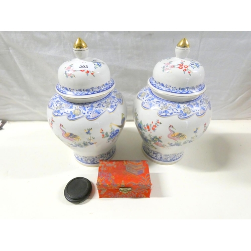 293 - Two large oriental style lidded urns.