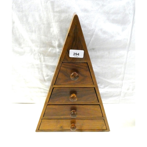 294 - Teak desktop drawers in the form of a pyramid.