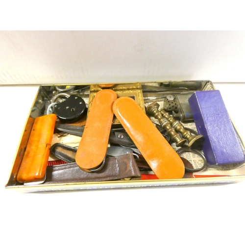 305 - Large box of vintage curios to include fruit knives, lighters, whistles etc.