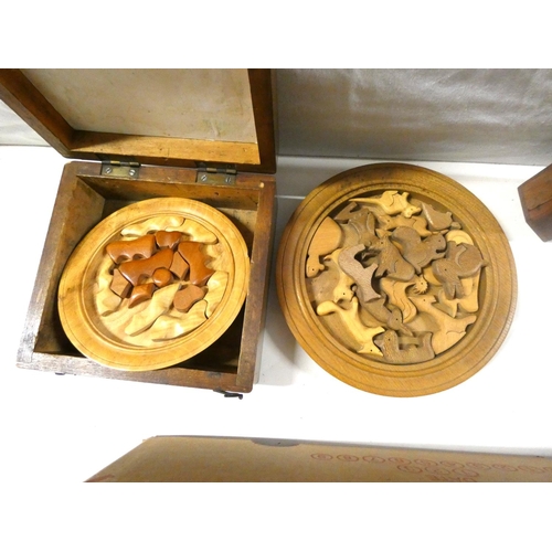 318 - Large box of treen to include jewellery box, puzzles etc.