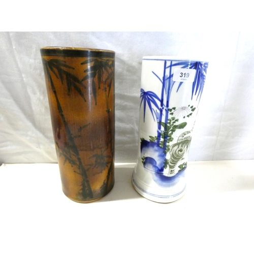 319 - Two large antique oriental vases.