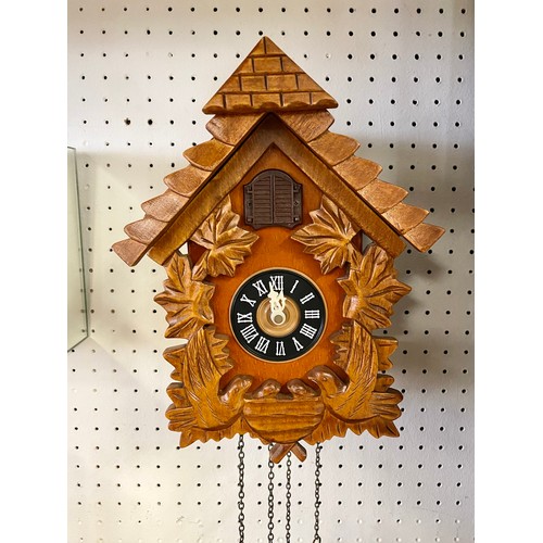 284 - Three assorted wall clocks