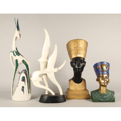 493 - Two model Pharaoh's heads and two other figures.