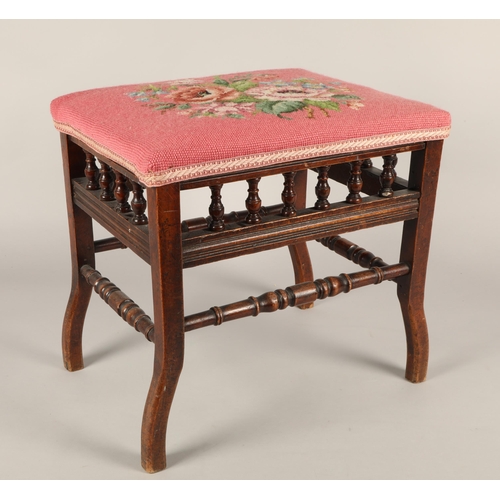 541 - Mahogany stool with needlework upholstery.