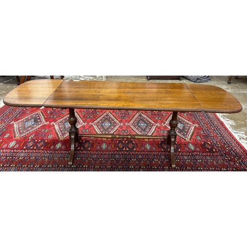 601 - Reproduction mahogany drop leaf coffee table 