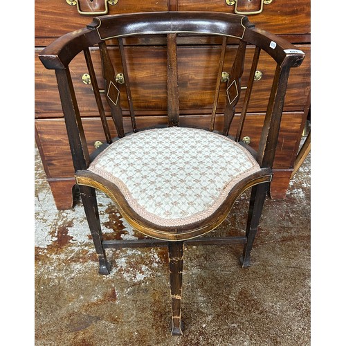 603 - Mahogany inlaid tub chair in floral upholstery 