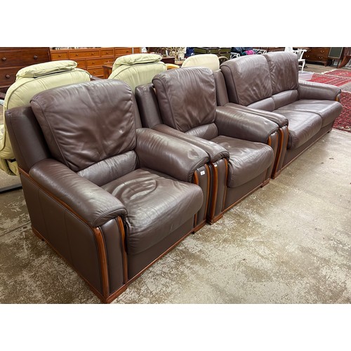 604 - Three piece leather suite comprising of three seater settee and two easy chairs