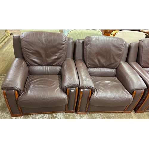 604 - Three piece leather suite comprising of three seater settee and two easy chairs