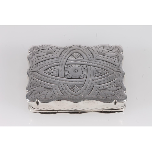 102 - Antique Victorian silver snuff box of rectangular shape with serpentine edge having incised floral d... 