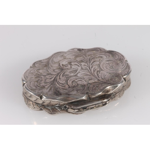 53 - Antique Victorian silver snuff box of oval shape with serpentine edge, the body decorated with all o... 