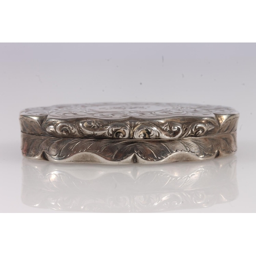 53 - Antique Victorian silver snuff box of oval shape with serpentine edge, the body decorated with all o... 