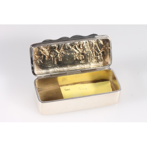 54 - Antique Edwardian silver table snuff box of rectangular shape, the lid decorated in repoussé with a ... 