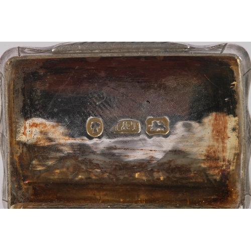 93 - Antique Victorian silver vinaigrette of rectangular shape with serpentine edge, the body decorated a... 