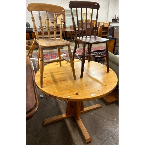 635 - Circular dining table with two dining chairs 