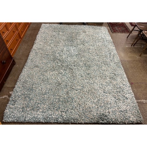 654 - Hand knotted rug by John Lewis, approx. 300cm x 200cm