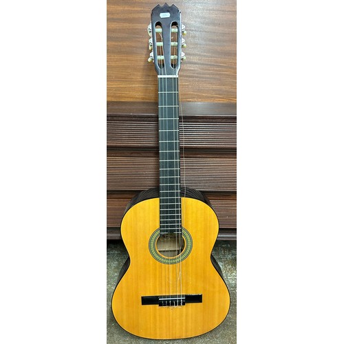 655 - 9 Nui acoustic guitar 