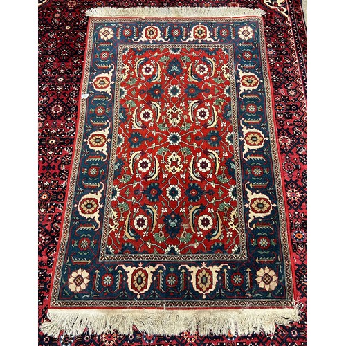 674 - Eastern-style floor rug, 159cm x 101cm