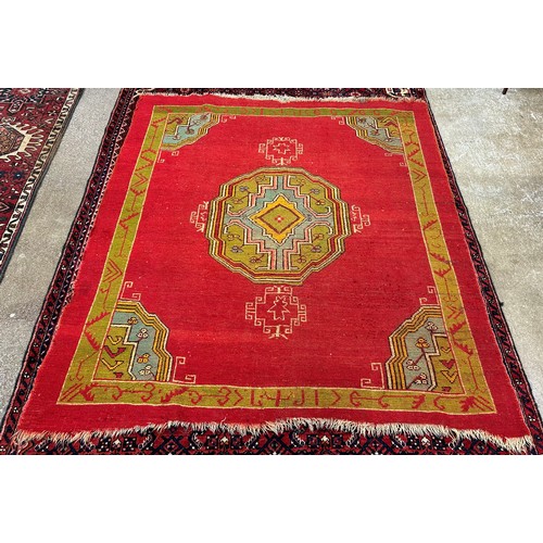 673 - Eastern-style floor rug, 175cm x 158cm