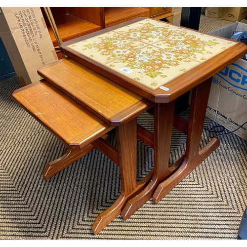 501 - Teak nest of three tables, the top table tiled