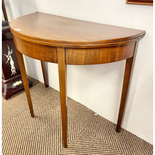 519 - 19th century mahogany demi-lune tea table.