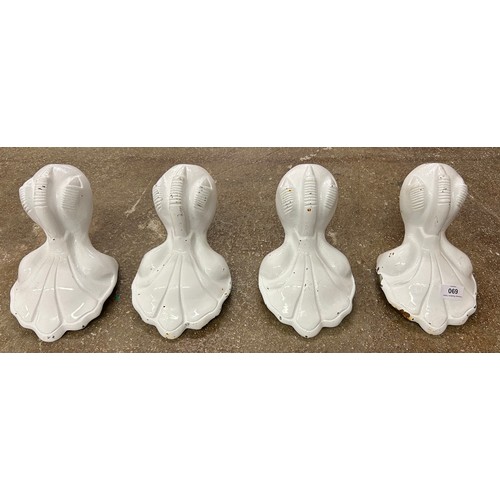 690 - Set of four white cast metal bathtub claw feet