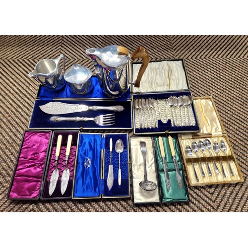 385 - Three piece picquot ware tea set and various cased cutlery including butter knives, preserve spoons ... 