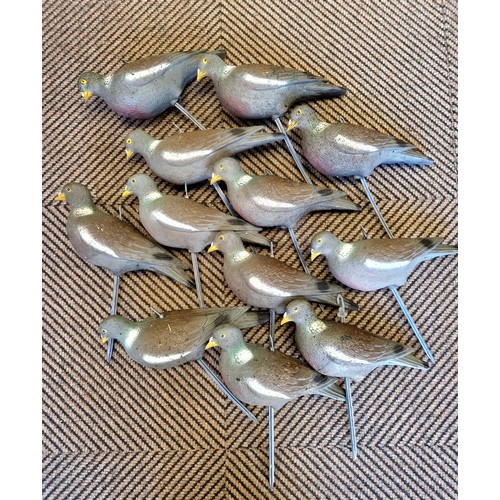 399 - Collection of pigeon decoys.