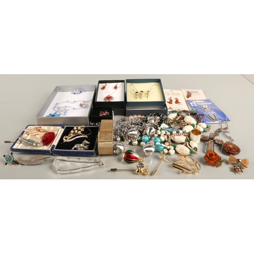 107 - Large quantity of costume jewellery to include earrings, some new in packaging, beads, brooches, som... 