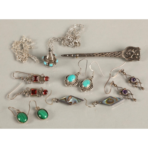 109 - Scottish silver pin with knot and lion detail, vintage silver gem set earrings, and turquoise set wh... 