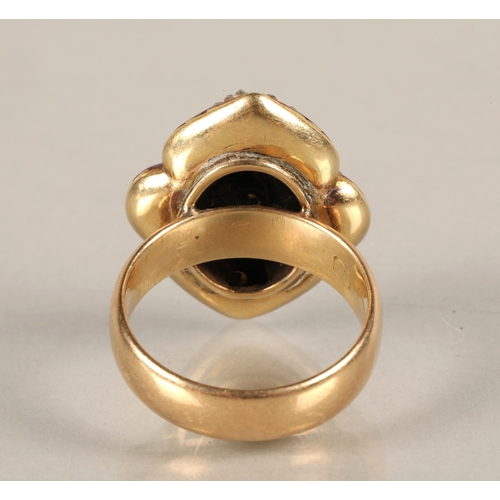 119 - Gold ring with worn hallmarks, red enamelled quatrefoil design set with diamonds and pearls, 12.9g, ... 