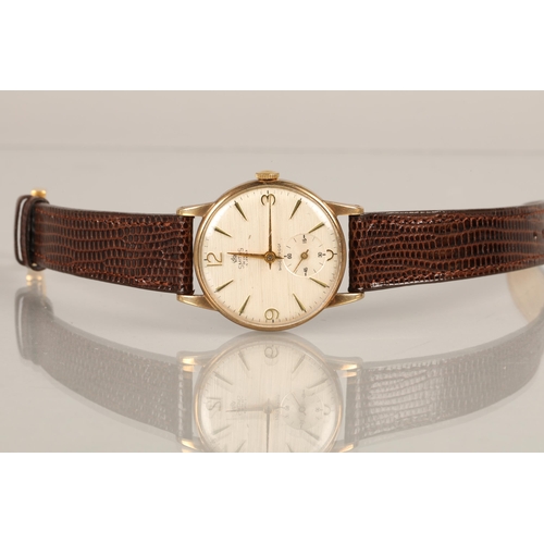 64 - 9ct gold Smiths gents wristwatch with subsidiary dial on leather strap, engraved to back